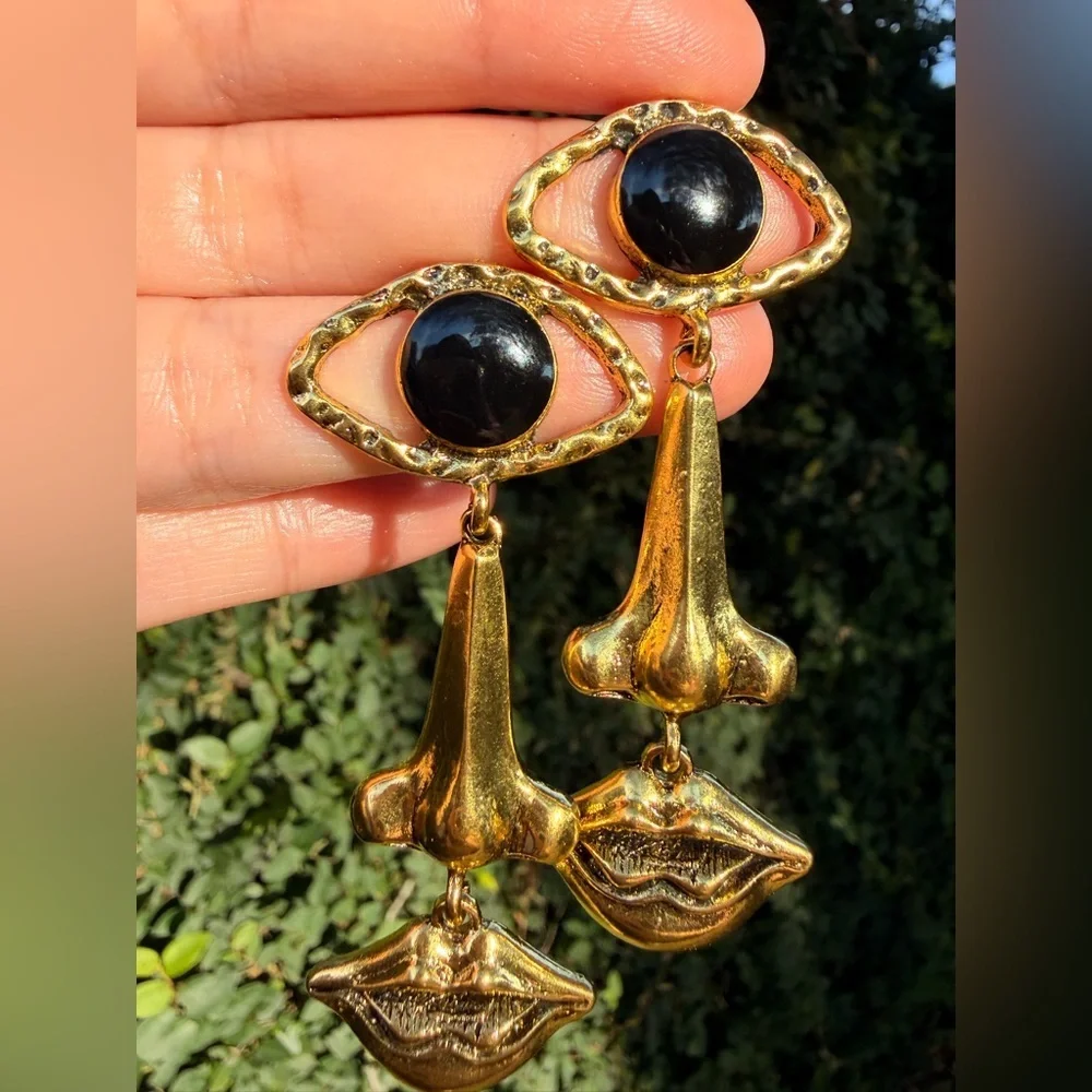 Gold and Black Eye Earrings Face